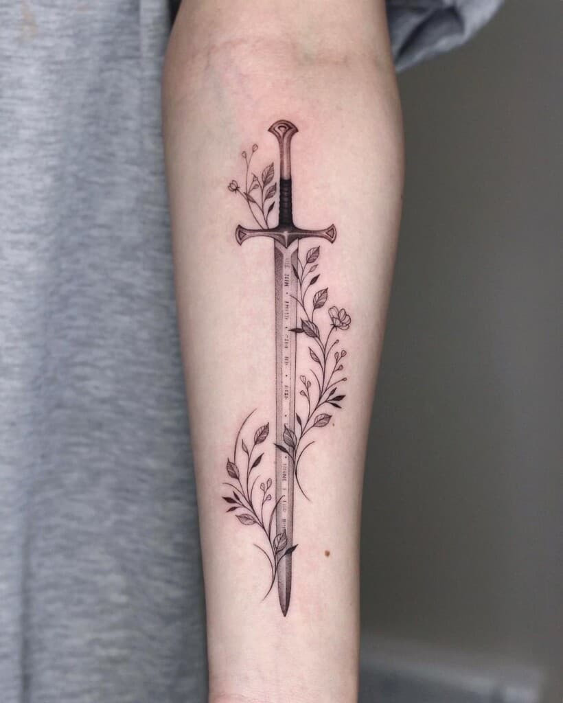 Blackwork sword tattoo design, utilizing solid black ink for a bold and graphic representation of the sword's form.