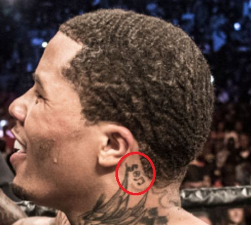 Gervonta Davis' symbols tattoo, representing music, wealth, and peace.