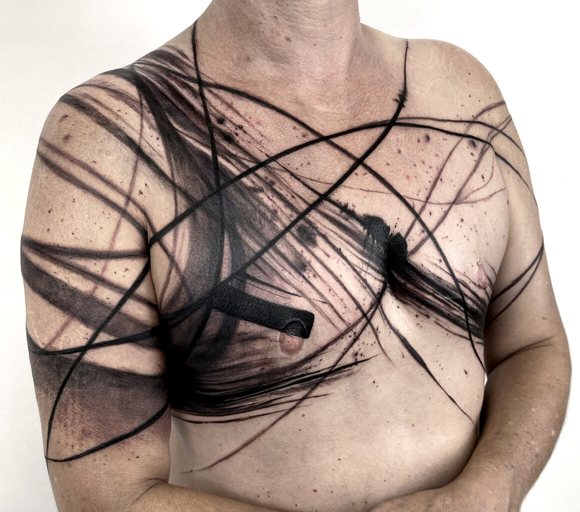 Full body abstract tattoo, displaying large-scale abstract artwork by Natalie Nox