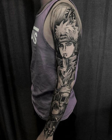 Anime sleeve tattoo featuring characters from popular anime series in vibrant colors