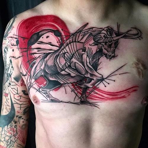 Large black and grey ink bull tattoo on the chest