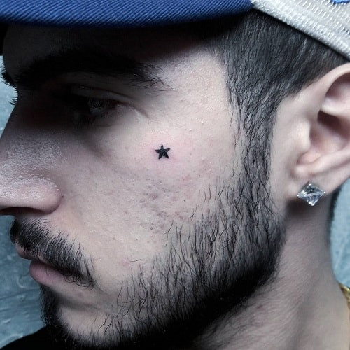 Tiny Star Tattoo