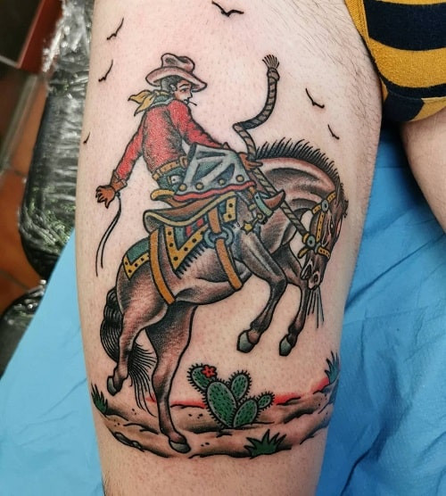 Bright and bold traditional cowboy tattoo on arm