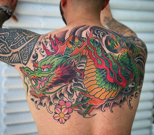 Brightly colored traditional American dragon tattoo