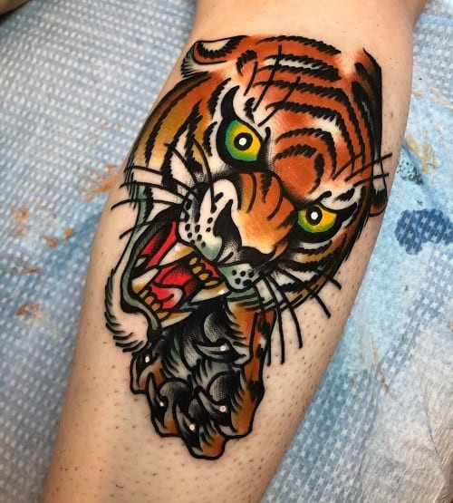 Bold traditional tiger tattoo with bright colors