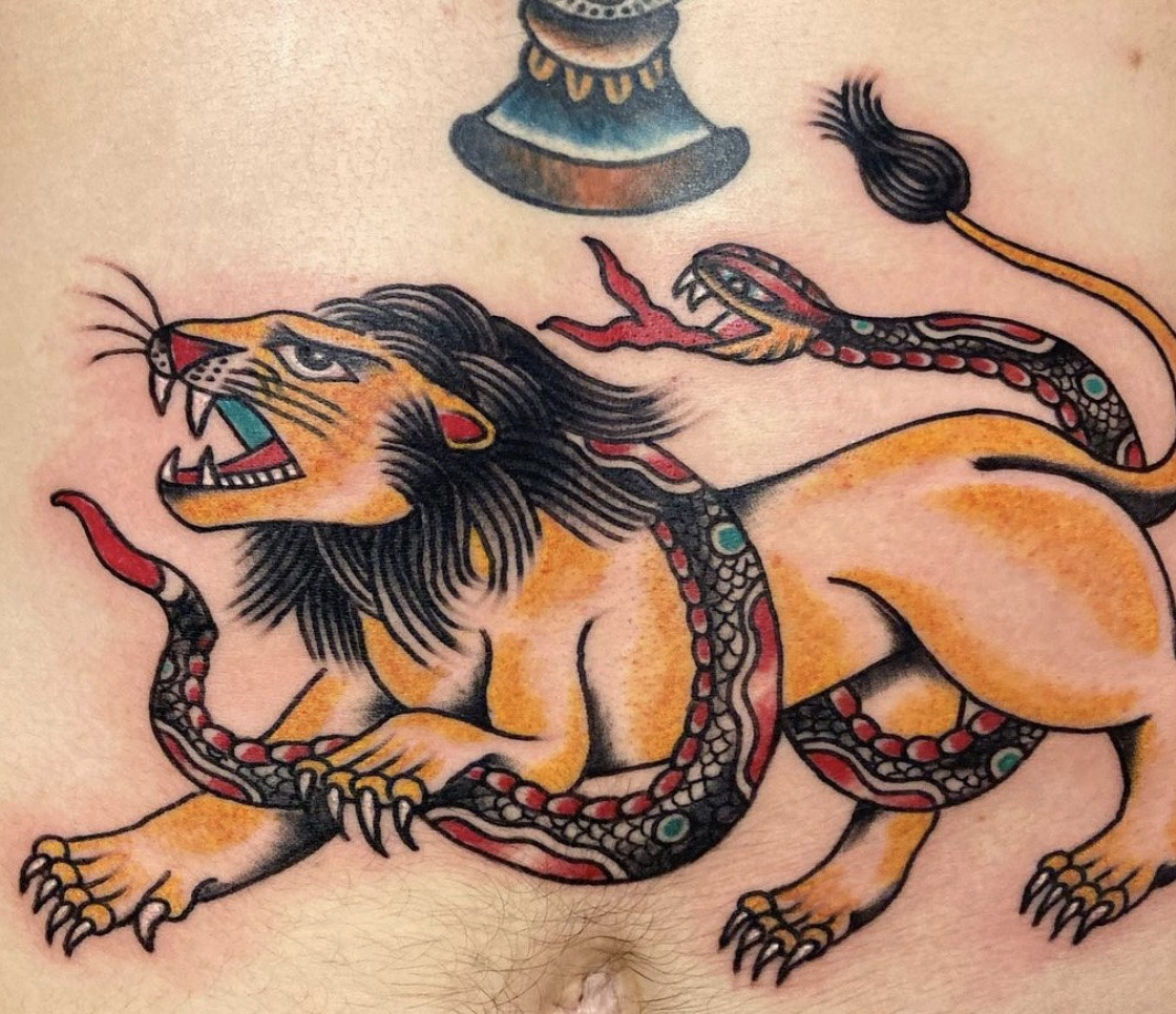 Traditional Lion Tattoo, bold lines and colors, classic tattoo style