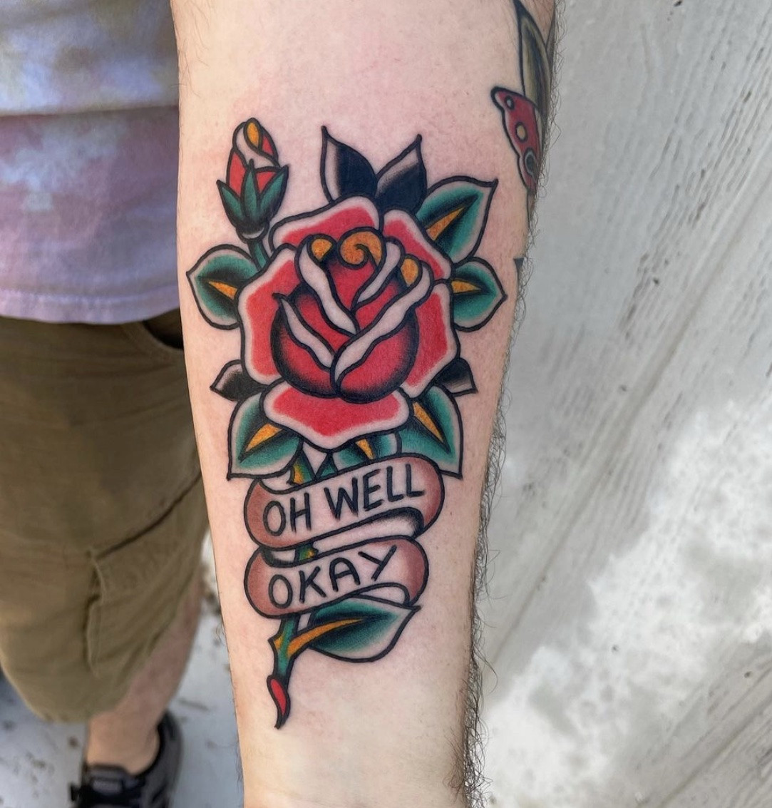 Classic traditional rose tattoo for men