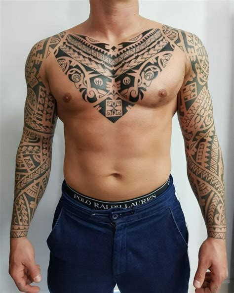 Tribal small chest tattoo for men