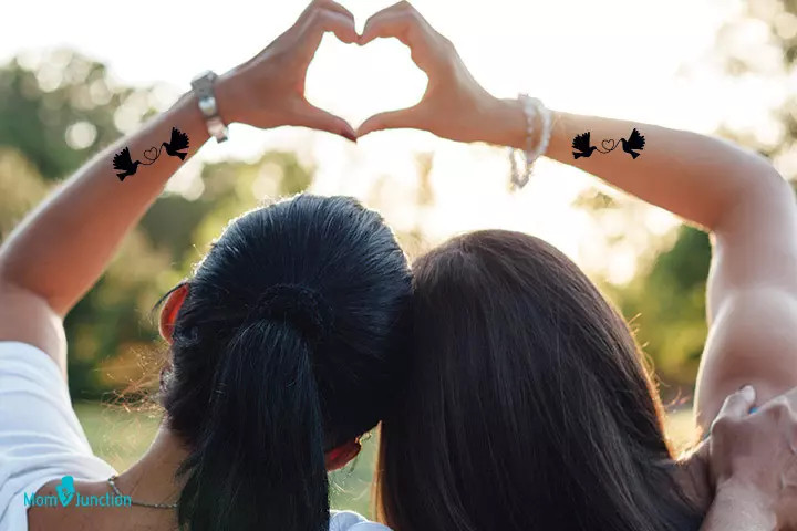 Turtle doves mother-daughter tattoo, symbolizing friendship and love