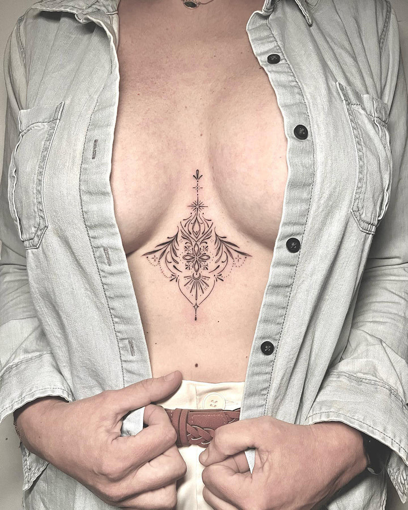 Mandala and lace under breast tattoo with dotwork details