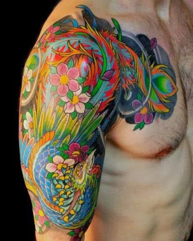 A surreal and illustrative tattoo design on a man's shoulder