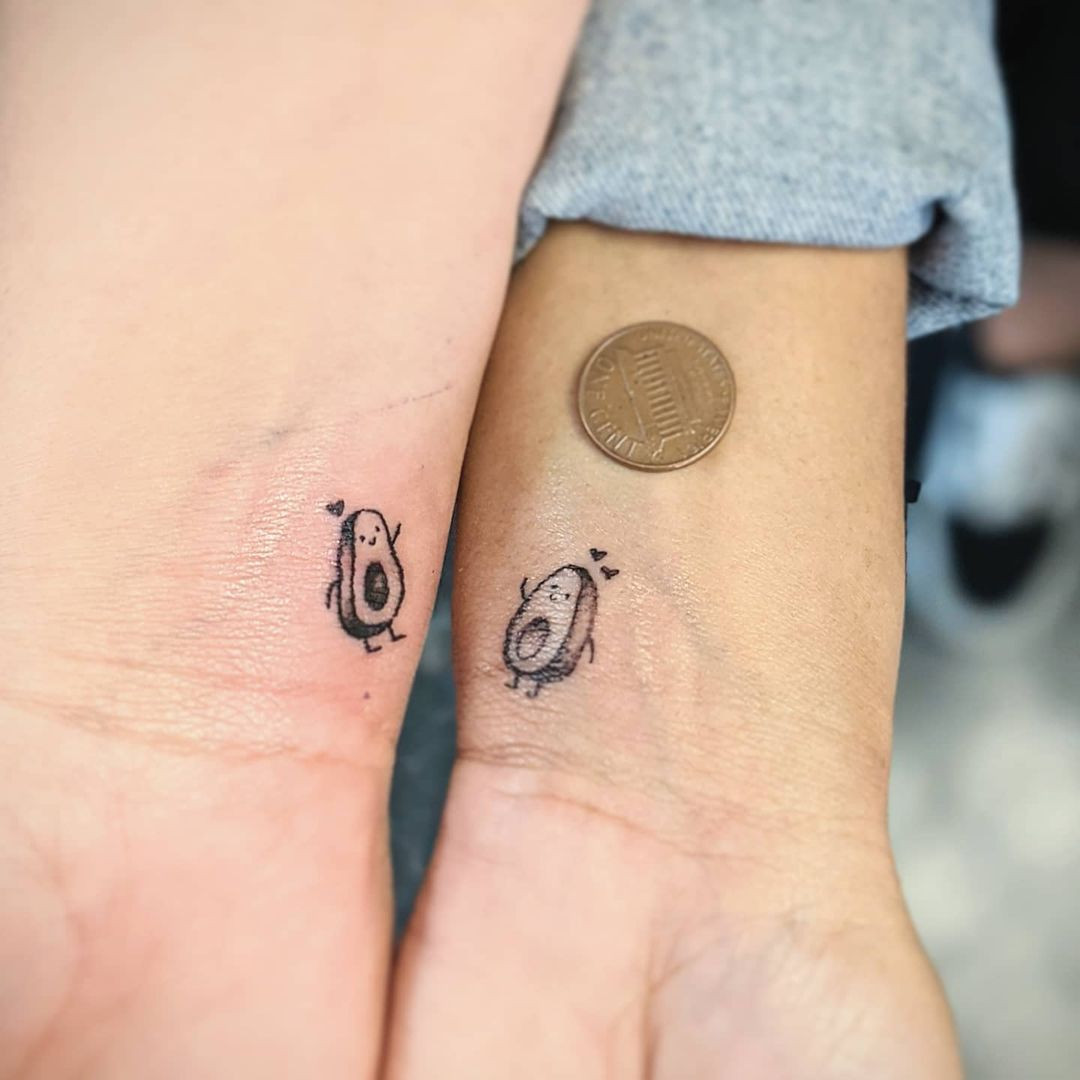 Avocado tattoos on arm, cute and food-themed for friends