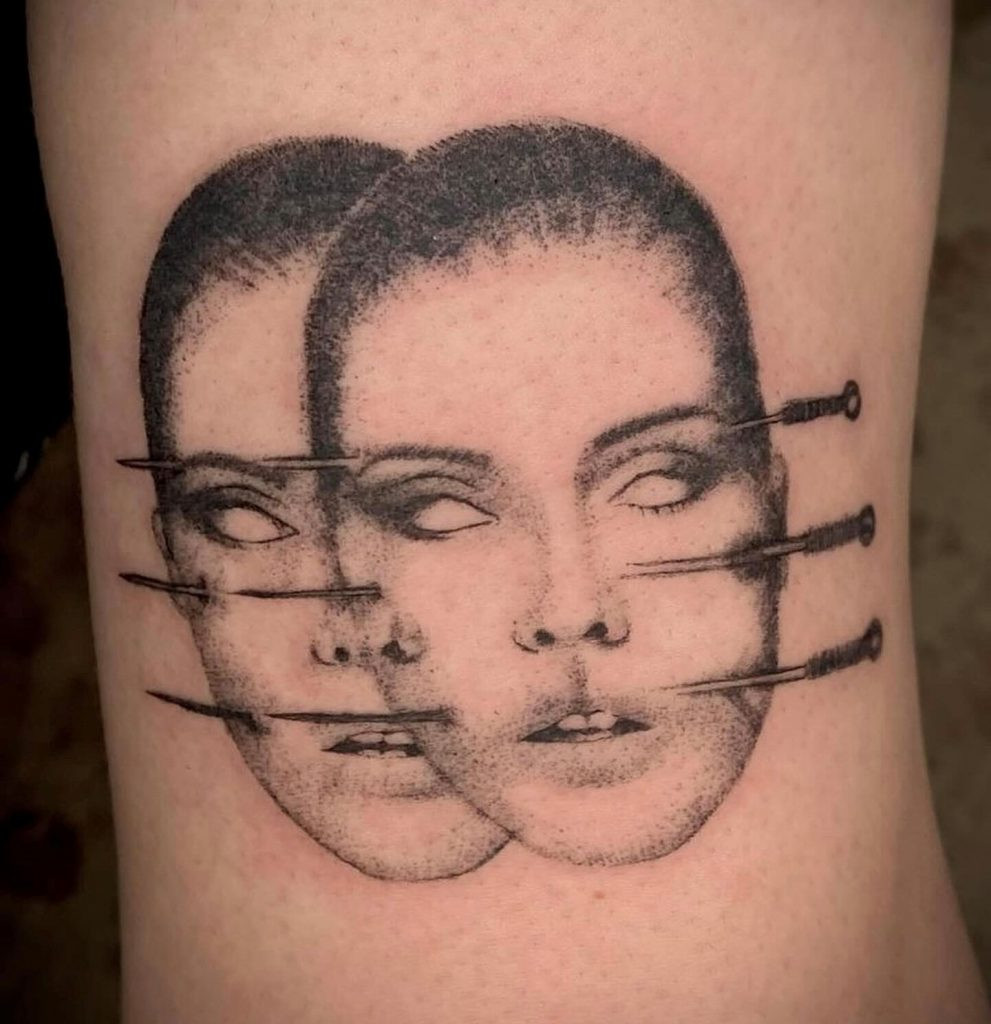 Another example of Olivia's horror tattoo style, focusing on spooky narratives.