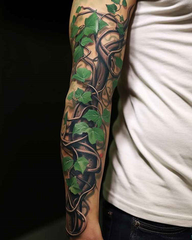 Vine tattoo sleeve men featuring ivy vines wrapping around the arm with leaves and berries