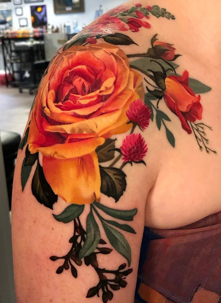 Classic rose shoulder tattoo design for men