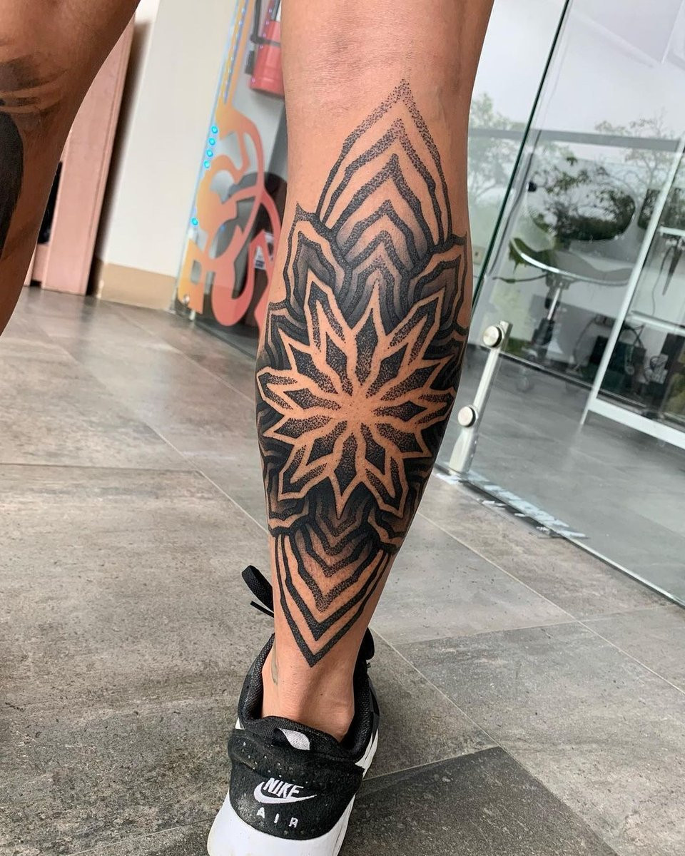 Calf Tattoo for Men with Intricate Design