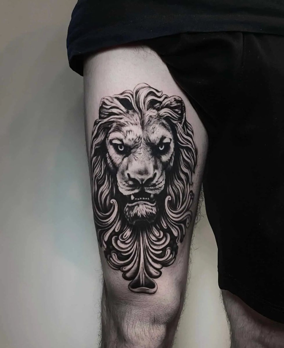 Lion Leg Tattoo with a Majestic and Fierce Expression