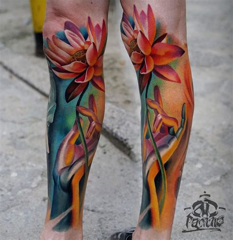 Delicate watercolor leg sleeve tattoo with soft pastel hues