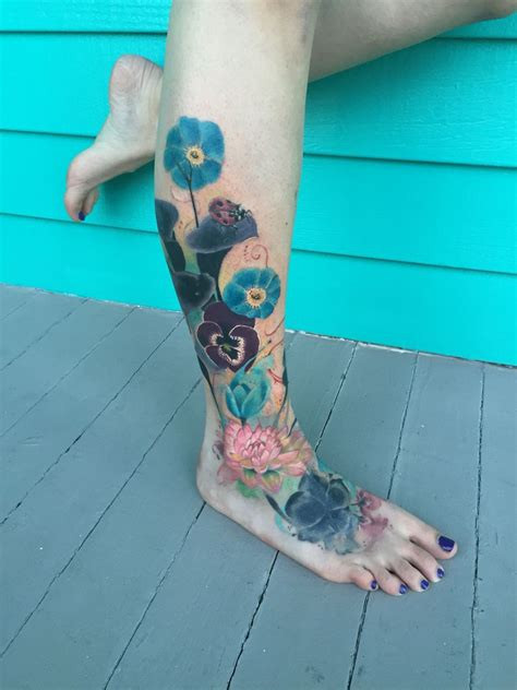 Watercolor leg sleeve tattoo example