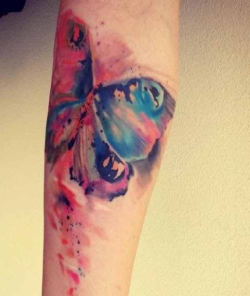 Vibrant watercolor butterfly tattoo effect