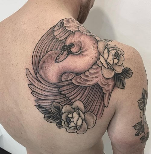 Pure white bird tattoo for men, often a dove, symbolizing peace, gentleness, and hope