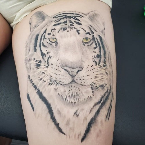 Mystical white tiger tattoo with spiritual symbolism