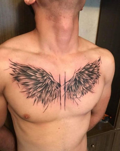 A pair of wings tattooed across the chest, symbolizing freedom, protection, and spiritual ascension.