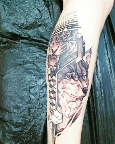 Protective wolf and tiger tattoo emphasizing family values