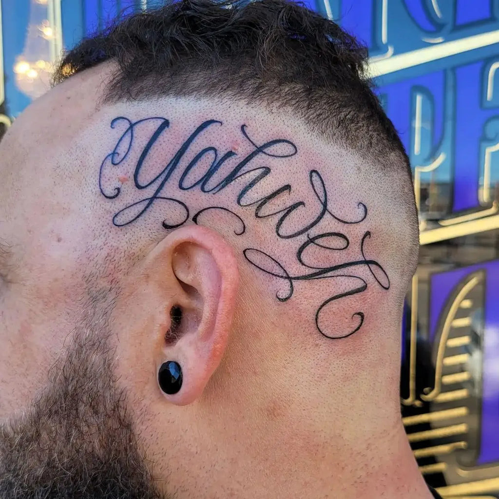 Yahweh Tattoo on the chest with bold Hebrew script and shading for depth