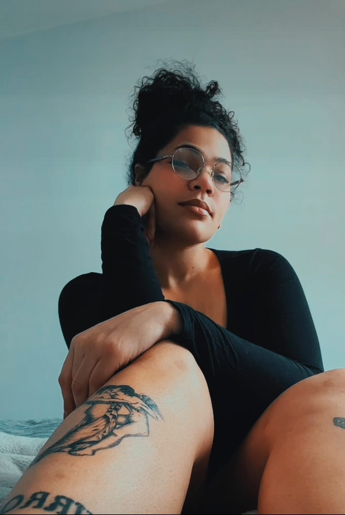 Yasmeena Dee, a talented fine line tattoo artist at Ghost Light Tattoo Parlor in Milwaukee