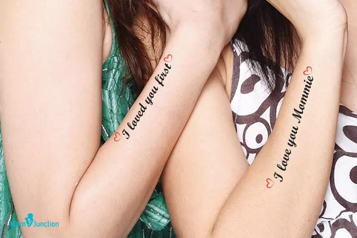 Calligraphy of love mother-daughter tattoo, highlighting mother's initial love