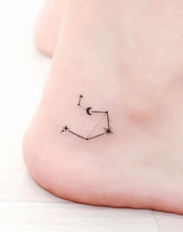 Zodiac constellation ankle tattoo, representing personal identity and astrological connection, intriguing and subtle