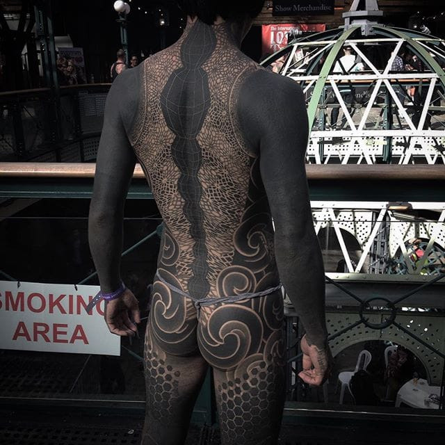 Large scale blackwork bodysuit tattoo by Gakkin