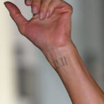 Jennifer Aniston wrist tattoo 11 11