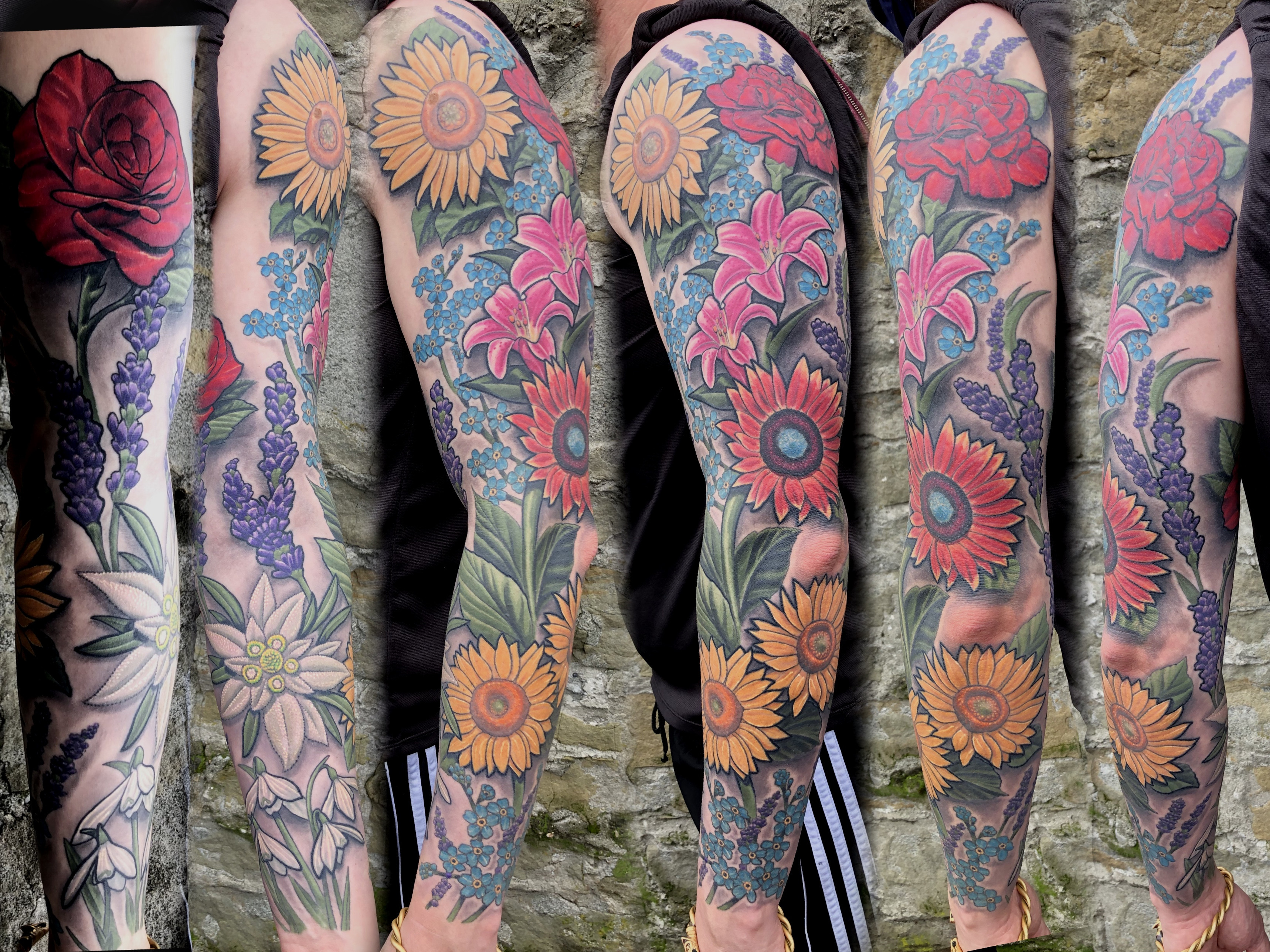 An arm with a tattoo sleeve and two hands working on it