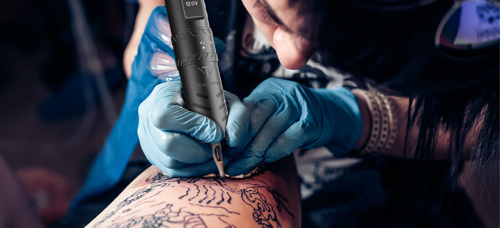 Proper way to hold a tattoo machine; mastering grip is critical for artistic skill and precision.