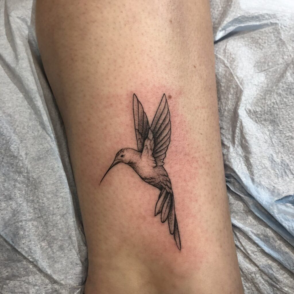 Fine line hummingbird tattoo