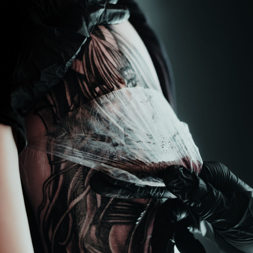 Applying Saniderm to a new tattoo