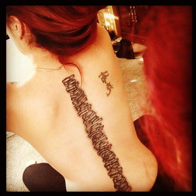 Book stack tattoo design