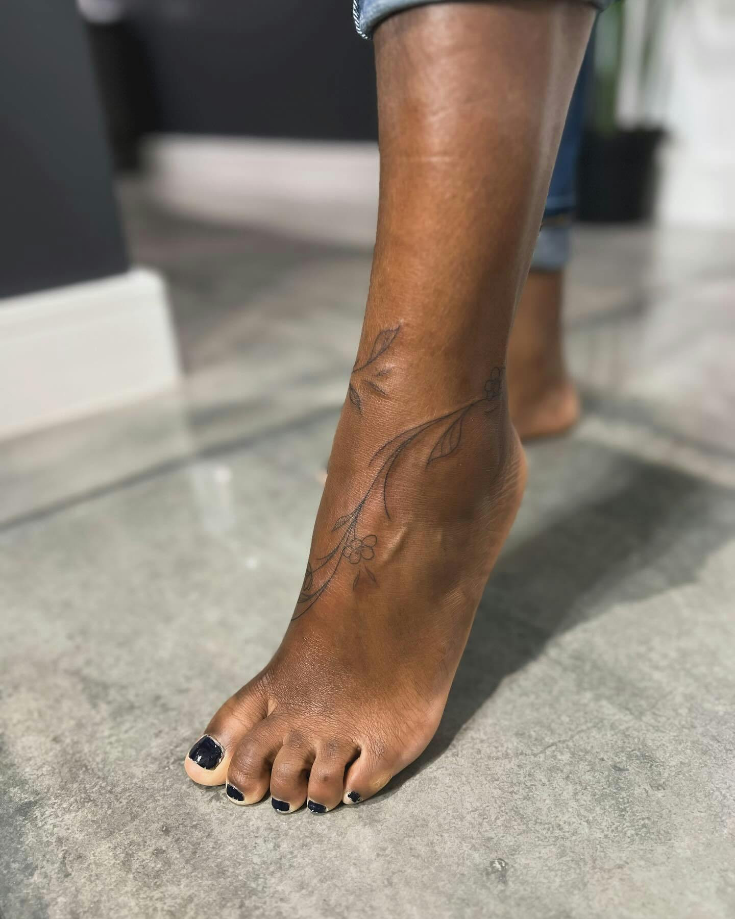 Vine ankle tattoo