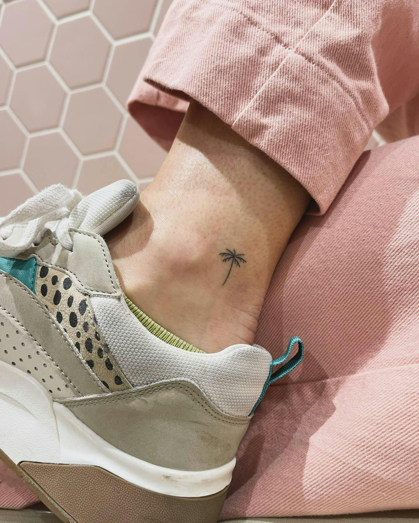 Palm tree ankle tattoo