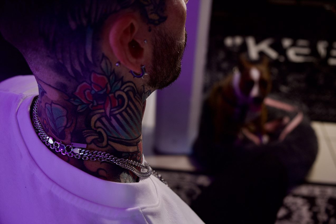 A close up of a rose tattoo on a man