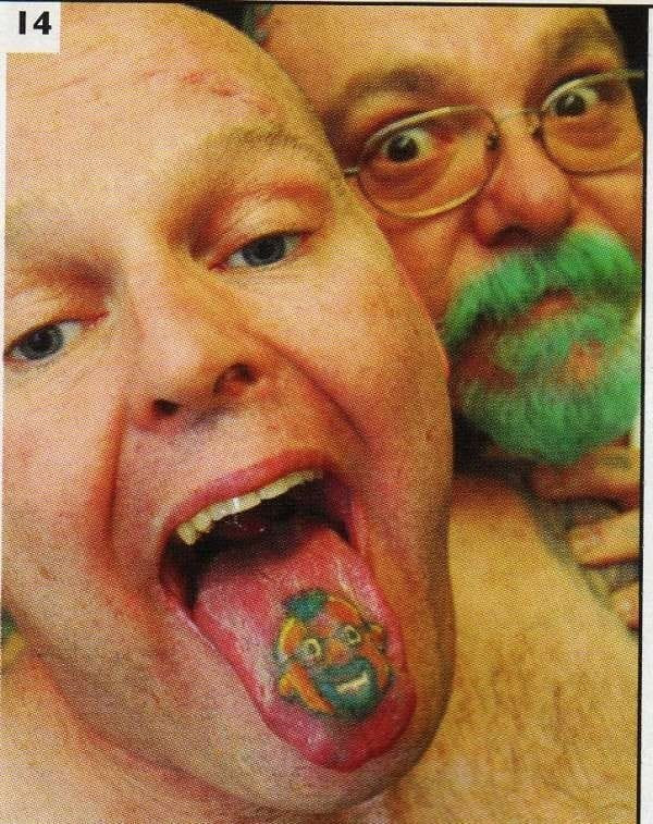 Close-up of a tongue tattoo with a simple black design