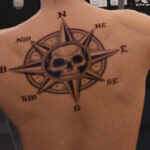 GTA 5 torso tattoo design featuring a skull compass with nautical elements, ideal for players seeking a bold and adventurous look