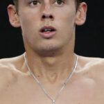 Close-up of Alex de Minaur's Davis Cup debut number tattoo, symbolizing his deep commitment to representing Australia in tennis.
