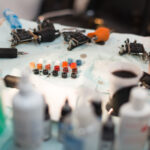 Tattoo artist work station with ink and other materials