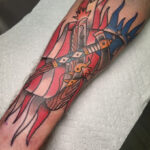 Illustrative Black and Gray Tattoo