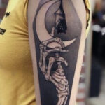 Black and Grey Tattoo on Arm