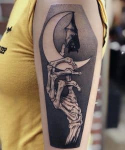 Black and Grey Tattoo on Arm