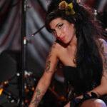 Amy Winehouse, despite having tattoos, was buried in a Jewish cemetery. (Wikimedia Commons)
